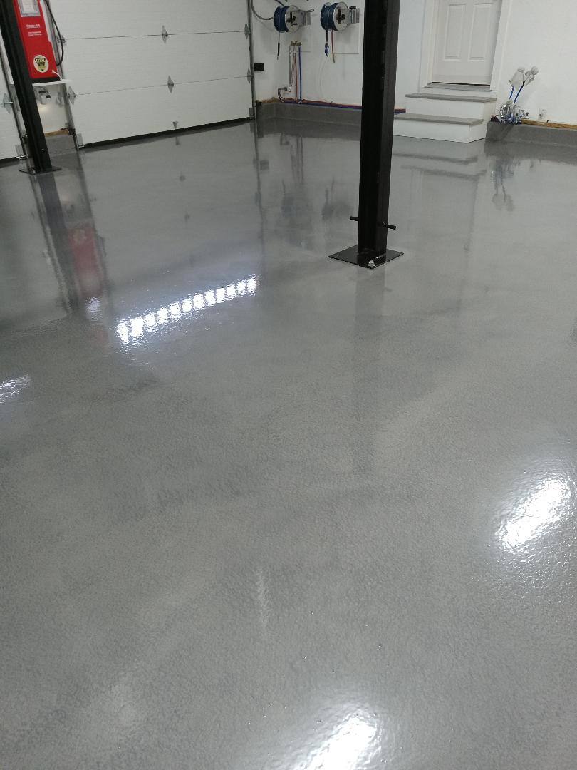 Garage Metallic epoxy floor. Plymouth, MA. Color: Manatee